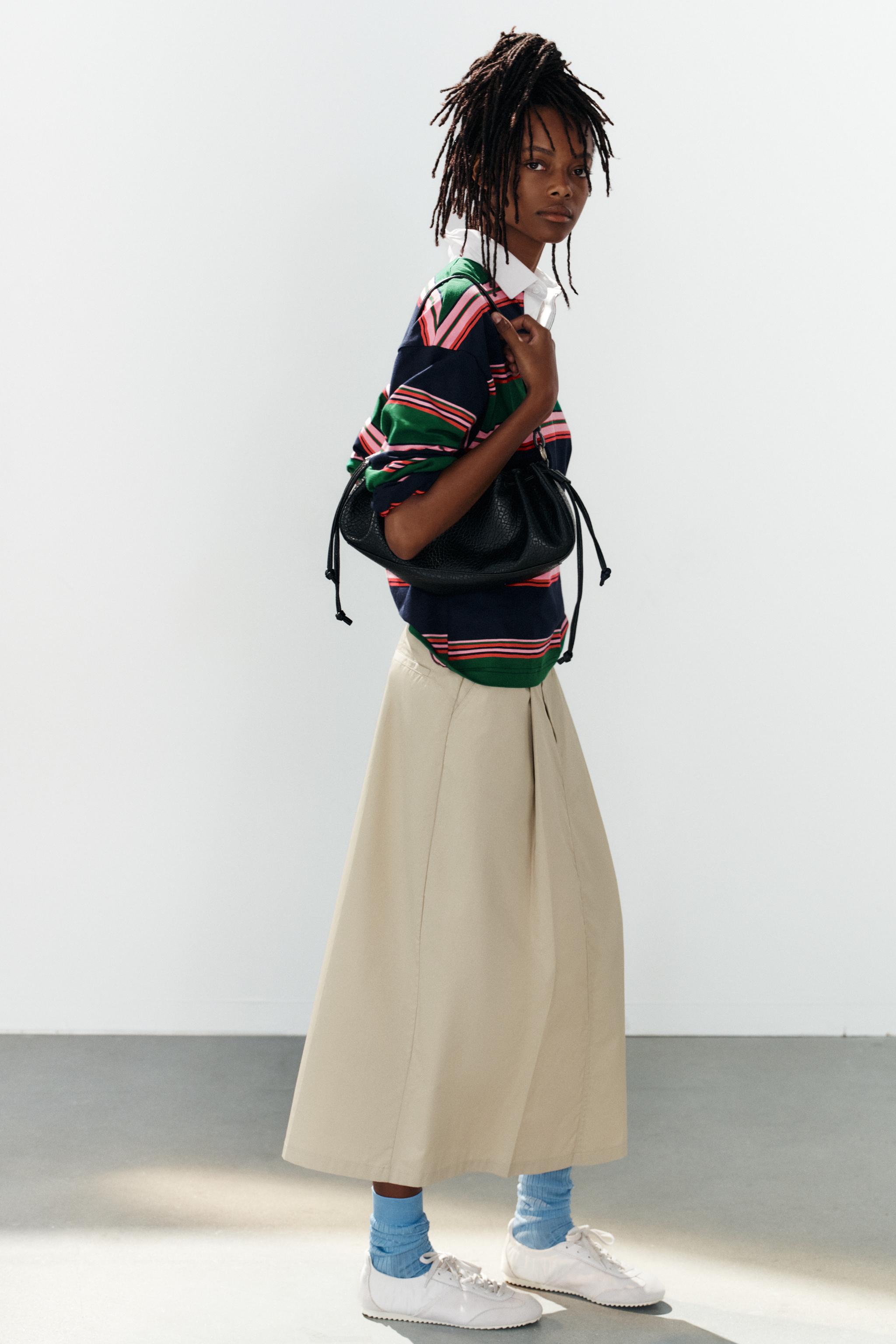 PLEATED MIDI SKIRT